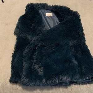 Dark green fur vest